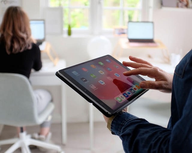 Photo of a person using an iPad