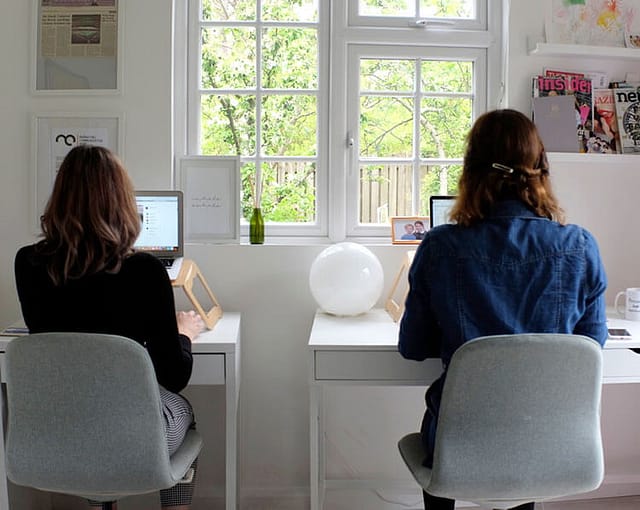 Carnsight Communications: photo of two women working on laptops