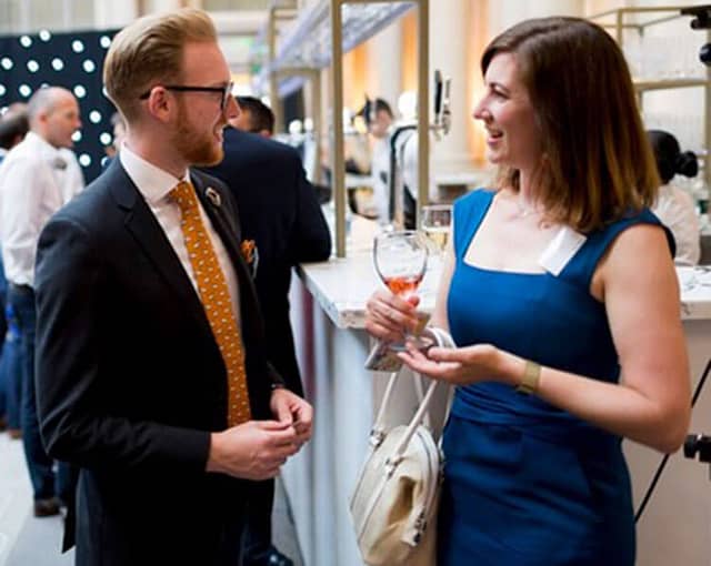 Photo of two people meeting at an event